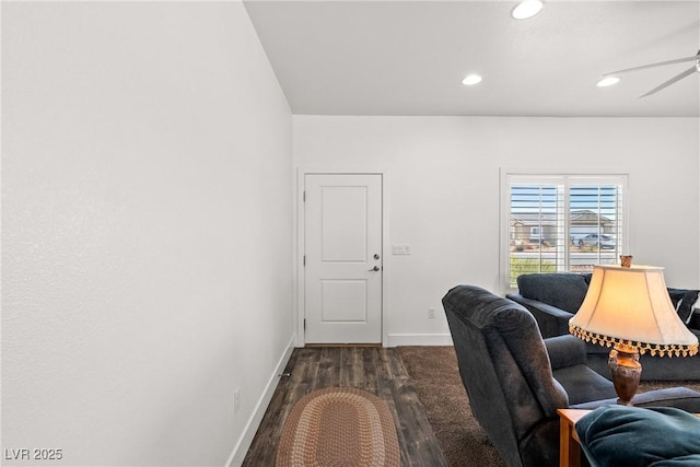 office area featuring dark wood-type flooring and ceiling fan