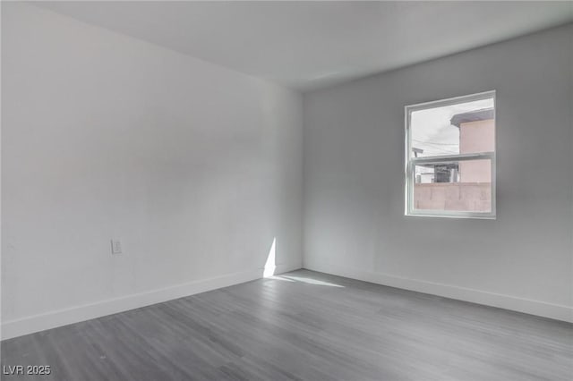 unfurnished room with light hardwood / wood-style flooring