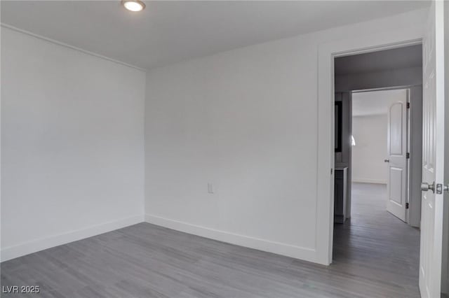 unfurnished room featuring hardwood / wood-style floors