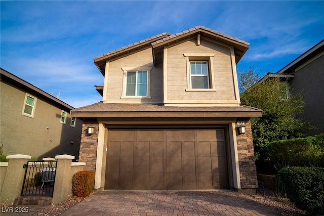 front of property featuring a garage