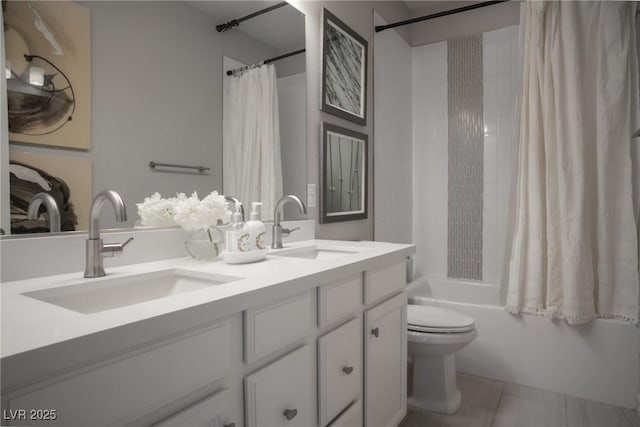 full bathroom featuring toilet, vanity, and shower / tub combo