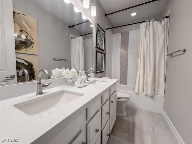 full bathroom with shower / bath combo, vanity, and toilet