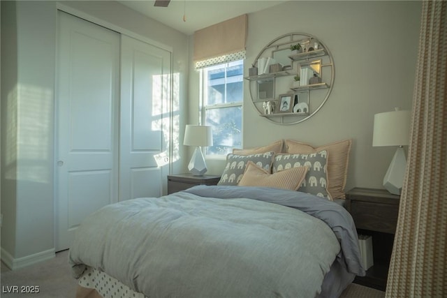 carpeted bedroom with a closet