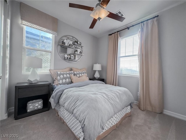 carpeted bedroom featuring ceiling fan