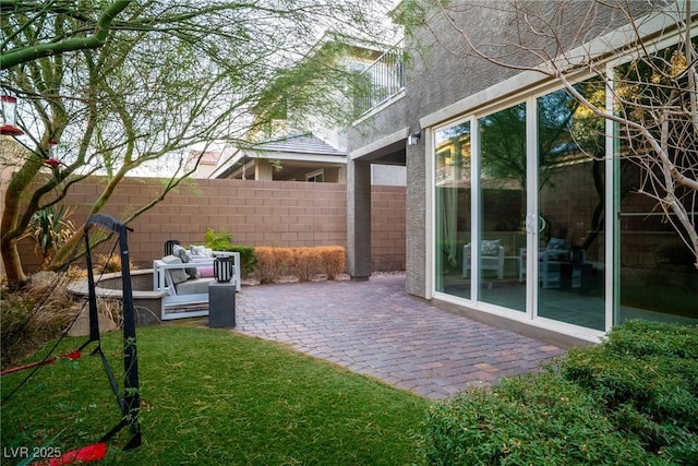 view of yard featuring a patio and outdoor lounge area