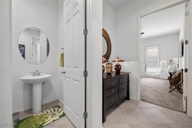 723 Orange Plume Walk Unit 0, Henderson, NV 89011 - bathroom with baseboards, a sink, and tile patterned floors