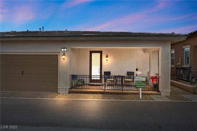 723 Orange Plume Walk Unit 0, Henderson, NV 89011 - view of front facade featuring an attached garage and stucco siding