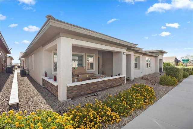 723 Orange Plume Walk Unit 0, Henderson, NV 89011 - view of front of property featuring central air condition unit and stucco siding