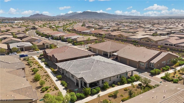 drone / aerial view featuring a mountain view