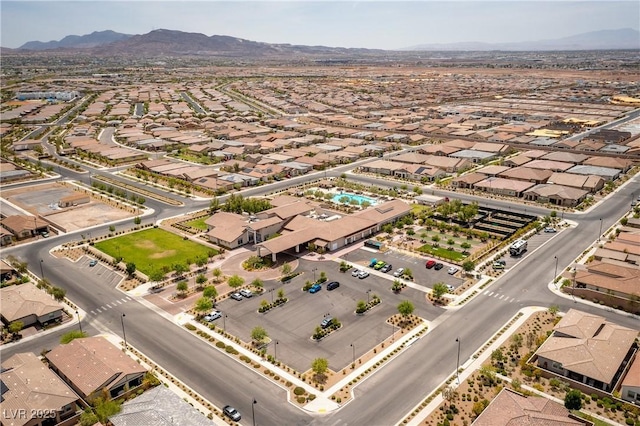 birds eye view of property featuring a mountain view