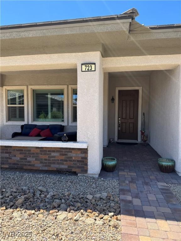 723 Orange Plume Walk Unit 0, Henderson, NV 89011 - view of exterior entry featuring stucco siding