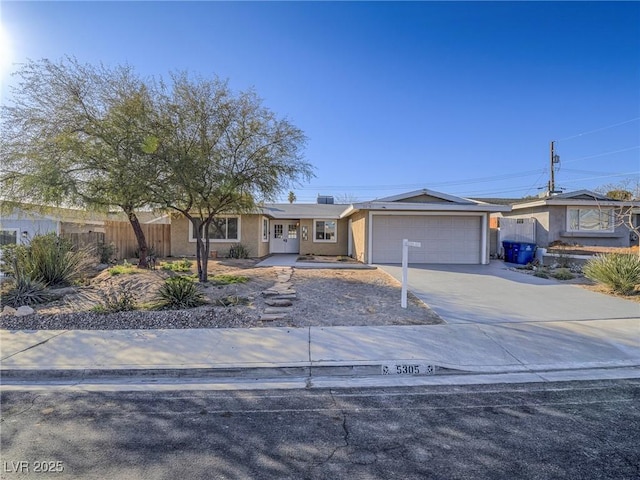 single story home featuring a garage