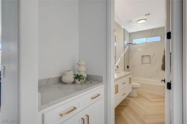 full bathroom with vanity, parquet flooring, shower / washtub combination, and toilet