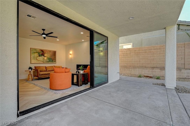 view of patio / terrace featuring ceiling fan