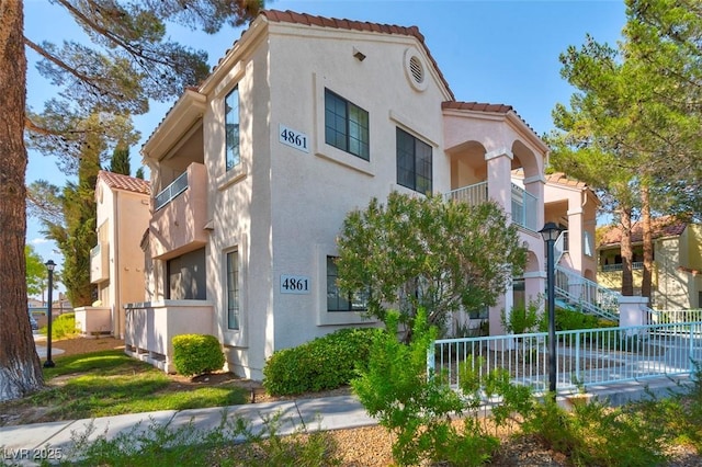 4861 S Torrey Pines Dr Unit 201, Las Vegas, NV 89103 - view of building exterior featuring fence