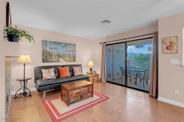 4861 S Torrey Pines Dr Unit 201, Las Vegas, NV 89103 - living room with wood finished floors and baseboards