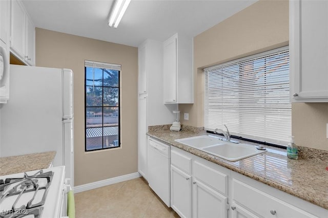 4861 S Torrey Pines Dr Unit 201, Las Vegas, NV 89103 - kitchen with white appliances, a sink, and white cabinets