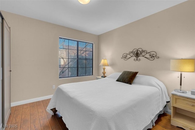 4861 S Torrey Pines Dr Unit 201, Las Vegas, NV 89103 - bedroom featuring hardwood / wood-style flooring and baseboards