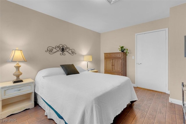 4861 S Torrey Pines Dr Unit 201, Las Vegas, NV 89103 - bedroom featuring wood-type flooring and baseboards