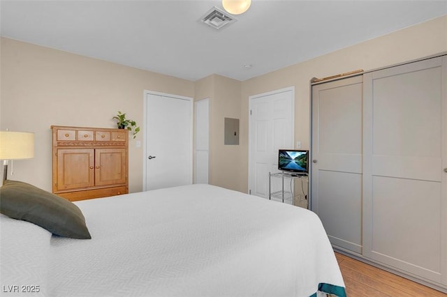 4861 S Torrey Pines Dr Unit 201, Las Vegas, NV 89103 - bedroom featuring light wood-style floors and electric panel