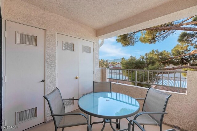 4861 S Torrey Pines Dr Unit 201, Las Vegas, NV 89103 - balcony with outdoor dining space