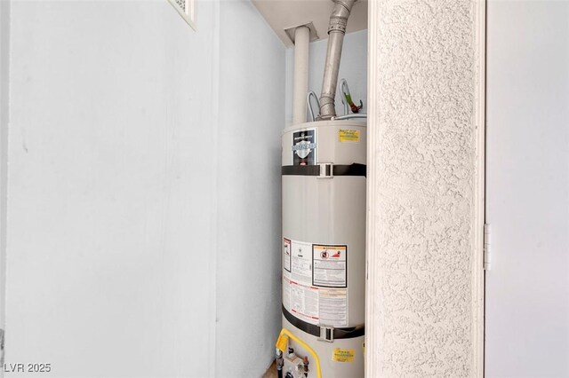 4861 S Torrey Pines Dr Unit 201, Las Vegas, NV 89103 - utility room featuring secured water heater