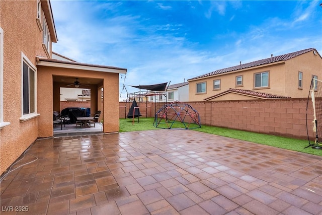 view of patio with ceiling fan