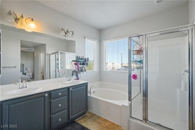 bathroom with vanity, shower with separate bathtub, and tile patterned flooring