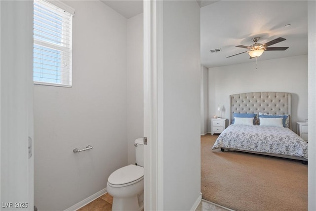 bedroom featuring ceiling fan and carpet flooring