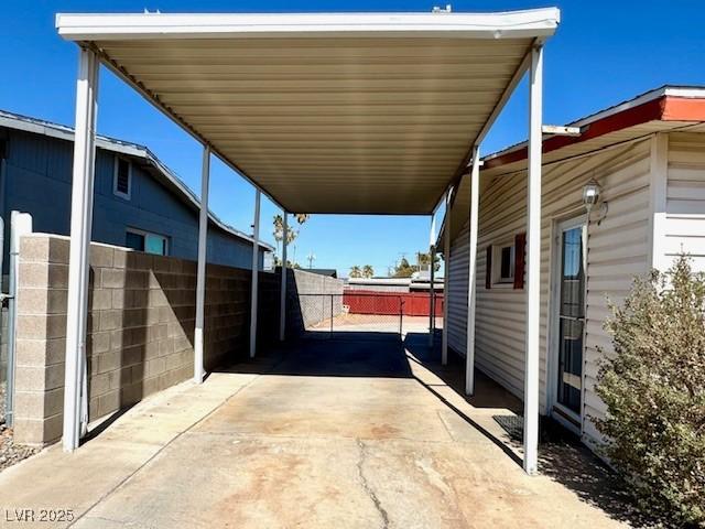 view of parking with a carport