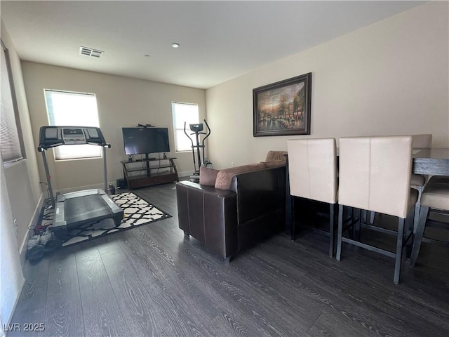 living room with dark wood-type flooring