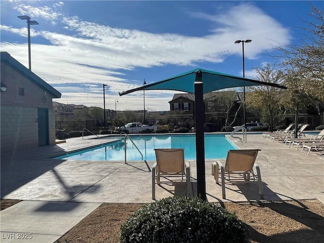 view of pool featuring a patio area