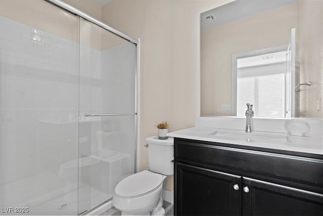 full bathroom with toilet, vanity, visible vents, and a shower stall