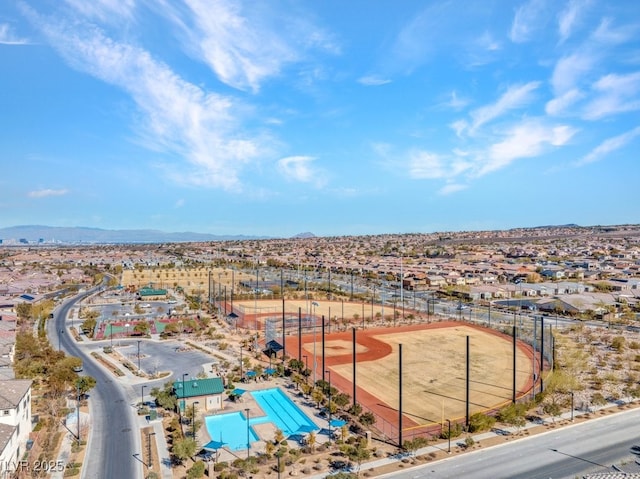 drone / aerial view with a residential view and a mountain view