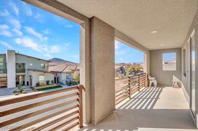 balcony featuring a residential view