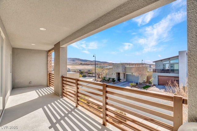 balcony featuring a mountain view