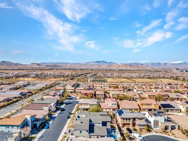 bird's eye view with a residential view and a mountain view