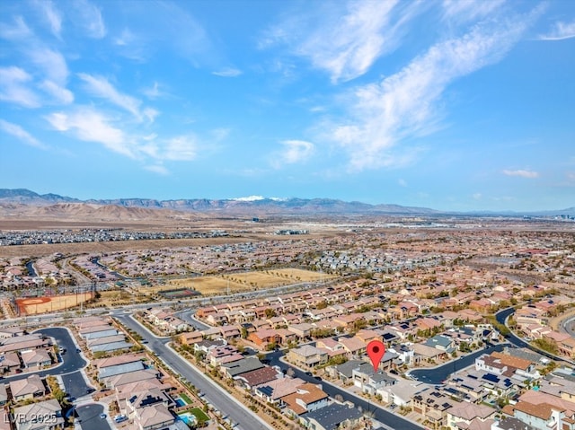 bird's eye view with a residential view and a mountain view