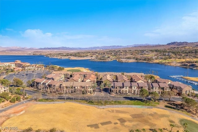 bird's eye view featuring a water and mountain view