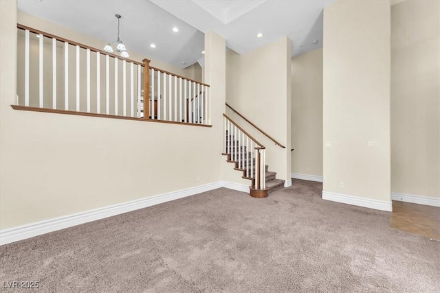 unfurnished living room featuring carpet floors