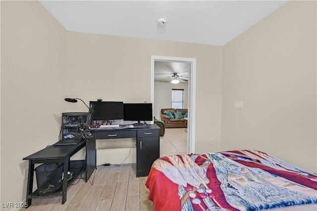 bedroom with wood tiled floor