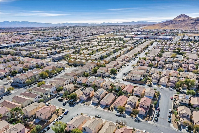 drone / aerial view with a mountain view and a residential view