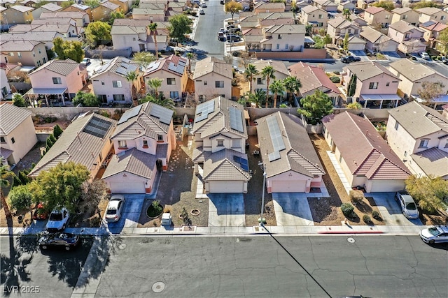 birds eye view of property with a residential view