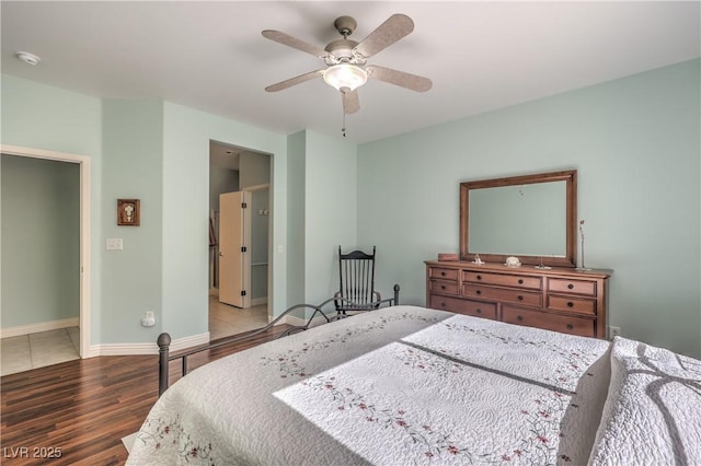 bedroom with hardwood / wood-style flooring and ceiling fan