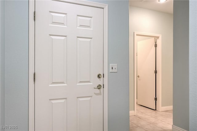 interior space featuring light tile patterned flooring