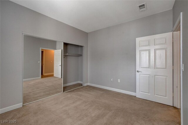 5250 S Rainbow Blvd Unit 2165, Las Vegas, NV 89118 - unfurnished bedroom featuring carpet flooring and a closet