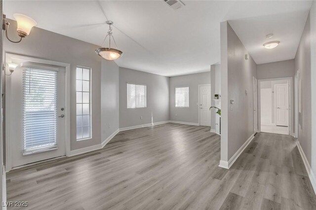 5250 S Rainbow Blvd Unit 2165, Las Vegas, NV 89118 - foyer with light wood-style flooring and baseboards