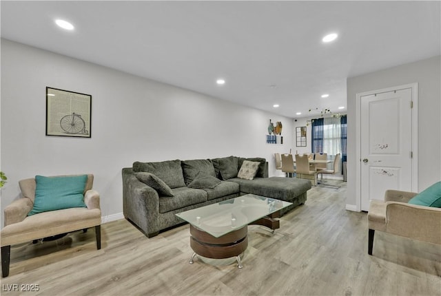 living room with light hardwood / wood-style floors