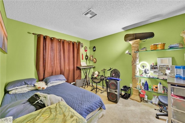 carpeted bedroom with a textured ceiling