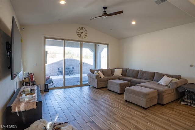 living room with ceiling fan, light wood-style flooring, recessed lighting, visible vents, and vaulted ceiling